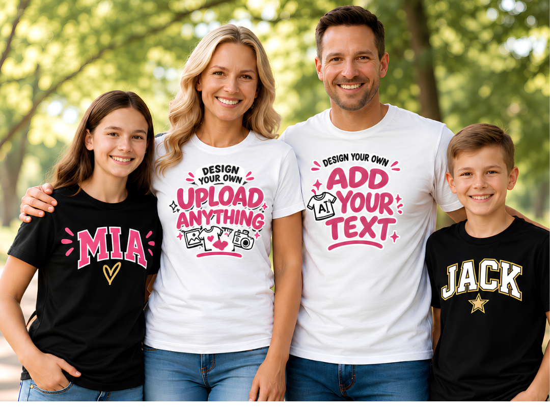 A family of four standing outdoors wearing customizable black and white graphic t-shirts. The mother wears a white shirt with pink and black text reading 'UPLOAD ANYTHING', the father wears a white shirt with pink and black text reading 'ADD YOUR TEXT', the daughter on the left wears a black shirt with pink and yellow text reading 'MIA', and the son on the right wears a black shirt with pink and gold text reading 'JACK'.