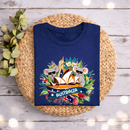 Navy blue t-shirt with Australia-themed design featuring koalas, the Sydney Opera House, and Australian flags for kids and adults