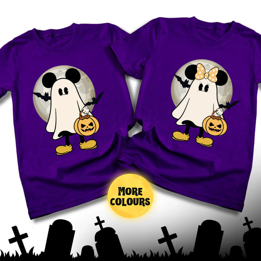 Two purple t-shirts with ghost designs on a white background