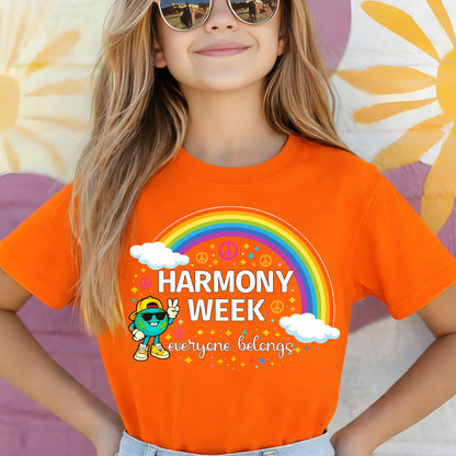 Child wearing an orange t-shirt with a rainbow design and 'Harmony Week' text.