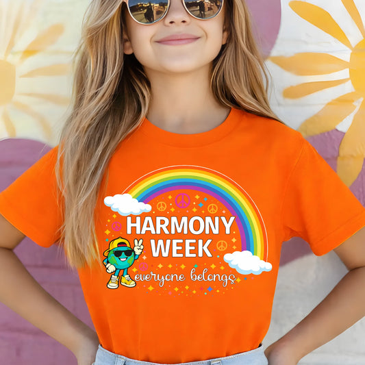 Child wearing an orange t-shirt with a rainbow design and 'Harmony Week' text.