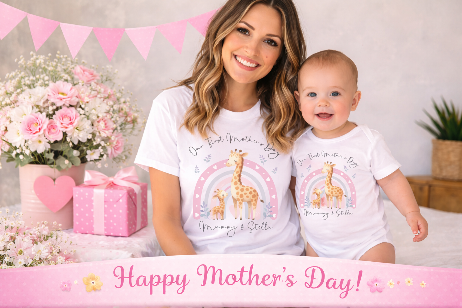 Woman and baby wearing matching Mother's Day-themed outfits with giraffes and rainbows, surrounded by flowers and gifts.