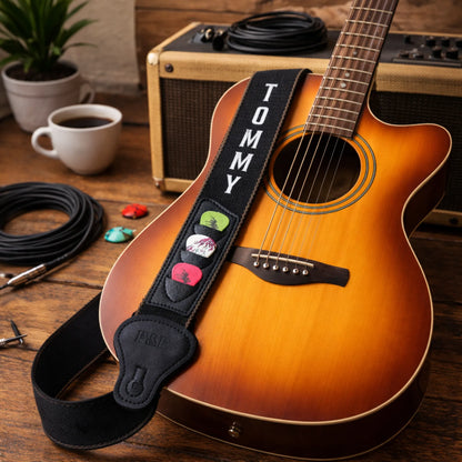 Black personalised cotton guitar strap with custom name on acoustic guitar